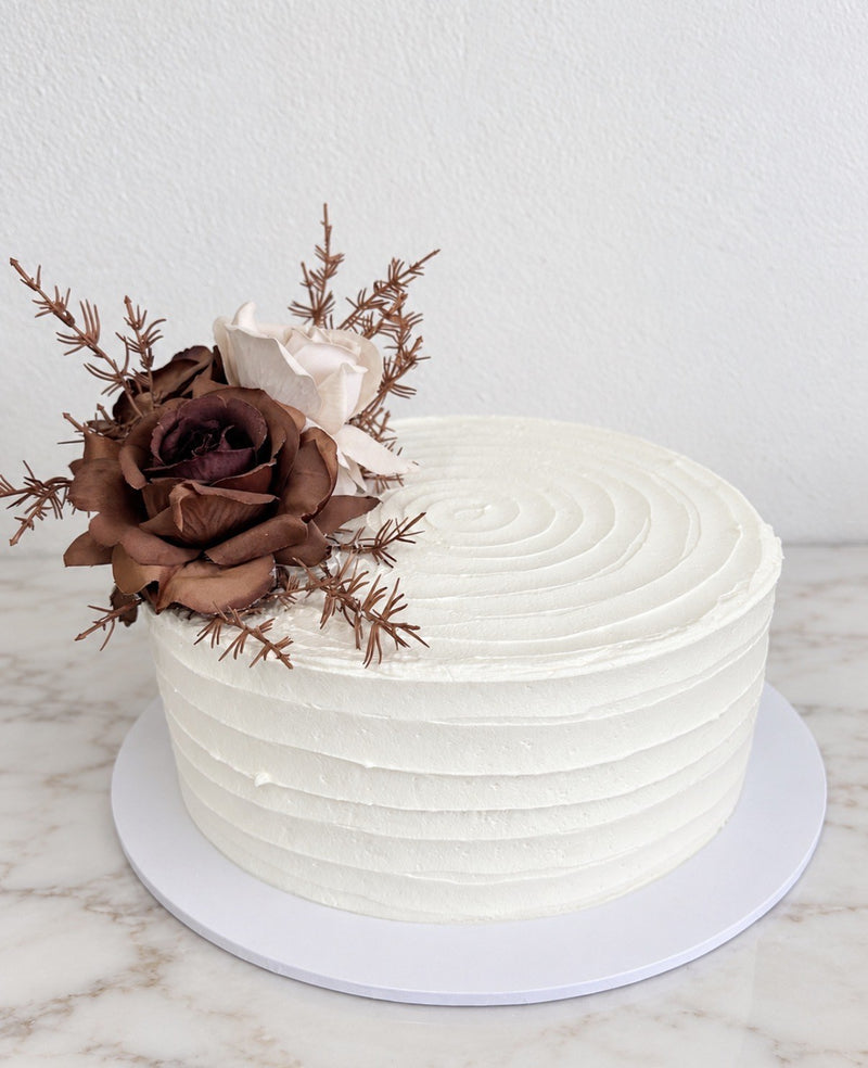 Textured buttercream cake with roses